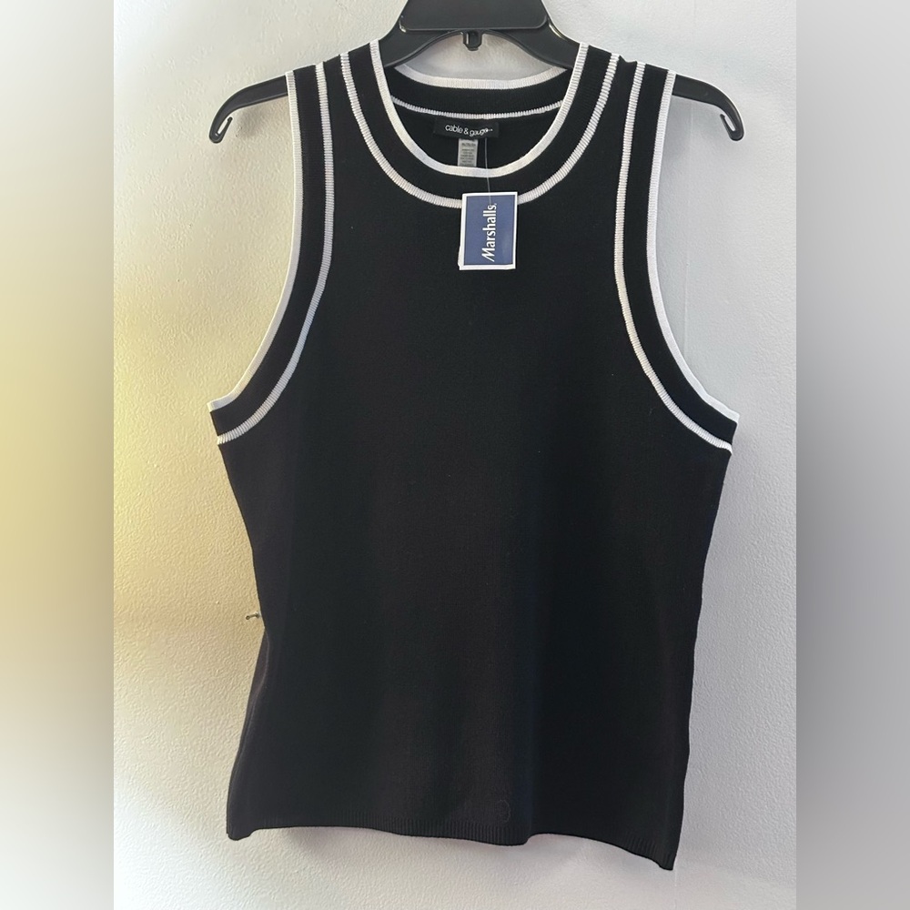 This is a black Cable & Gauge sleeveless top with white trim.